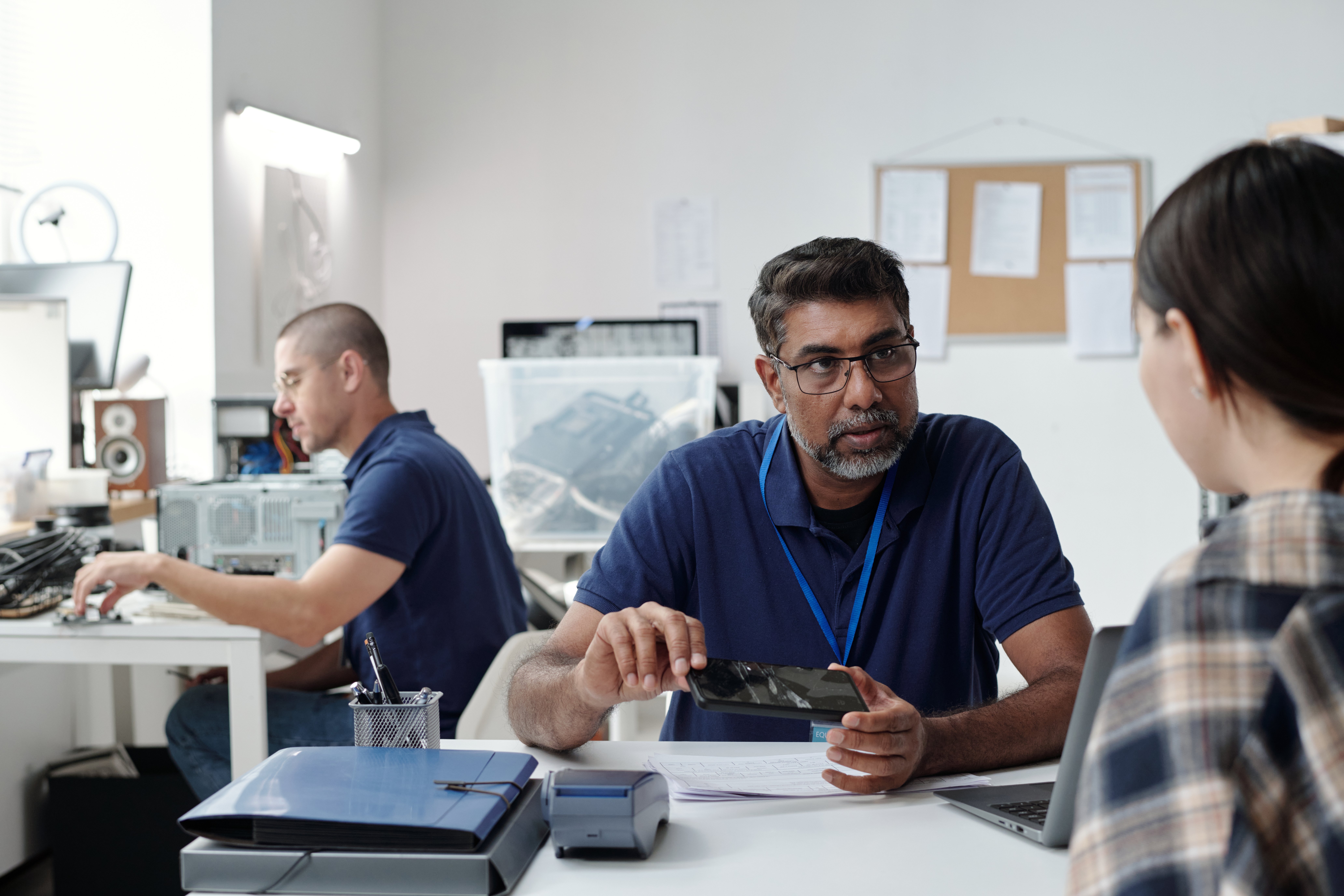 discussing-technology-project-in-modern-office-env-2025-03-15-18-38-05-utc